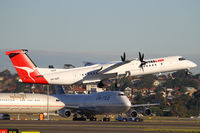 VH-QOF @ YSSY - away from 34L - by Bill Mallinson