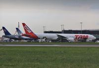 PT-MUC @ EGLL - Being loaded on stand - by John Coates