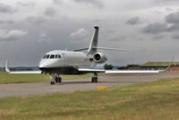 M-IKEL @ EGHH - Taxies past the Flying Club - by John Coates