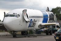 G-GPFI @ EGHH - In European car park..to become crew trainer - by John Coates