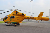 G-LNCT @ EGLC - Parked outside Helitech 2013 at the Excel Centre next to London City Airport. - by Graham Reeve