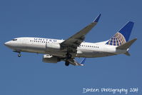 N17730 @ KSRQ - United Flight 1727 (N17730) arrives at Sarasota-Bradenton International Airport following a flight from Chicago-O'Hare International Airport - by Donten Photography