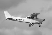 N2117X @ FXE - On final approach to runway 8 - by Bruce H. Solov