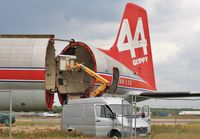 9G-LCA @ EGHH - Swingtail open for interior work - by John Coates
