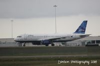N613JB @ KMCO - JetBlue Flight 583 (N613JB) Bahama Blue arrives at Orlando International Airport following a flight from John F Kennedy International Airport - by Donten Photography