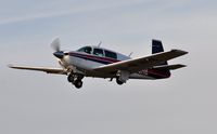 G-BJHB @ EGFH - Visiting Mooney 201 departing Runway 22. - by Roger Winser