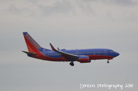 N745SW @ KMCO - Southwest Flight 2145 (N745SW) arrives at Orlando International Airport following a flight from Bishop International Airport - by Donten Photography