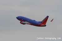 N223WN @ KMCO - Southwest Flight 1976 (N223WN) departs Orlando International Airport enroute to Raleigh-Durham International Airport - by Donten Photography