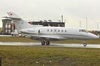 TC-ILY @ EGGW - 2005 Hawker 800XP, c/n: 258748 at Luton - by Terry Fletcher