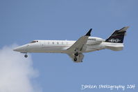 N448GL @ KSRQ - Learjet 60 (N448GL) on approach to Sarasota-Bradenton International Airport following a flight from Henderson Executive Airport - by Donten Photography