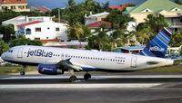 N595JB @ TNCM - N595JB
