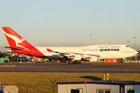 VH-OEG @ YSSY - taxi from 34L - by Bill Mallinson