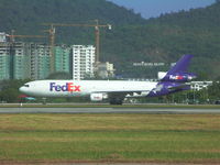 N614FE @ WMKP - FedEx MD11