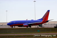 N472WN @ KMCO - Southwest Flight 2219 (N472WN) taxis at Orlando International Airport prior to a flight to General Mitchell Airport - by Donten Photography