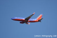 N401WN @ KMCO - Southwest Flight 807 (N401WN) departs Orlando International Airport enroute to Denver International Airport - by Donten Photography