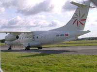 HB-AEU @ EGHH - At Signatures - by John Coates