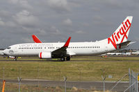 VH-YFL @ YSSY - taxiing to r/w 34R - by Bill Mallinson