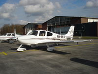 PH-SFK @ EHGG - Cirrus SR22 at ramp of Groningen airport - by Jack Poelstra