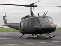 N41574 @ CAX - This UH-1H Iroquois was seen at Carlisle en route to Scotland in September 2005 prior to taking up United Kingdom registration three months later. When seen it was registered as NX41574. - by Peter Nicholson