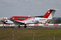 VH-AMQ @ YSSY - RFDS taxiing to 34R - by Bill Mallinson