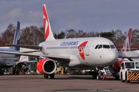 OK-MEL @ EGHH - Awaiting delivery after repaint to latest livery - by John Coates