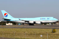 HL7490 @ YSSY - taxiing from 34L - by Bill Mallinson