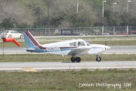 N253WM @ KSRQ - Piper Cherokee (N253WM) taxis at Sarasota-Bradenton International Airport - by Donten Photography