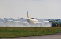 EC-331 @ EGHH - Lots of reverse thrust in the damp. - by John Coates