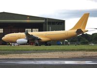 EC-331 @ EGHH - Entering the hangar for months of fitting out. - by John Coates