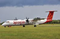 VT-SUB @ EGHH - Taxiing in on arrival on delivery Canada to India. - by John Coates