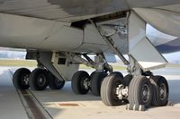 N476MC @ LOWG - AtlasAir B-747 main gear - by Paul H