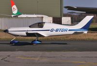 G-BTRD @ EGHH - Taxiing home - by John Coates