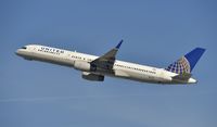 N17128 @ KLAX - Departing LAX on 25R - by Todd Royer