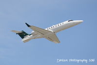 N401SF @ KSRQ - Learjet 45 (N401SF) departs Sarasota-Bradenton International Airport enroute to New Castle Airport - by Donten Photography