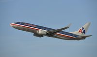N939AN @ KLAX - Departing LAX on 25R - by Todd Royer