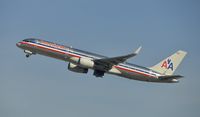 N660AM @ KLAX - Departing LAX on 25R - by Todd Royer