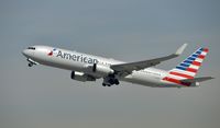 N345AN @ KLAX - Departing LAX on 25R - by Todd Royer