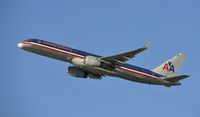 N663AM @ KLAX - Departing LAX on 25R - by Todd Royer