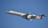 N529EA @ KLAX - Departing LAX on 25R - by Todd Royer