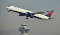 N837MH @ KLAX - Departing LAX on 25R - by Todd Royer