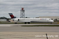 N925DN @ KSRQ - Delta Flight 2298 (N925DN) taxis at Sarasota-Bradenton International Airport - by Donten Photography