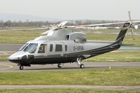 G-URSA @ EGBJ - 2007 Sikorsky S-76C, c/n: 760699 at Gloucestershire Airport on Day 1 of the 2014 Cheltenham Horse Racing Festival - by Terry Fletcher