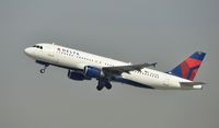 N367NW @ KLAX - Departing LAX on 25R - by Todd Royer