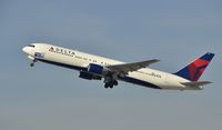 N139DL @ KLAX - Departing LAX on 25R - by Todd Royer