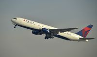 N190DN @ KLAX - Departing LAX on 25R - by Todd Royer