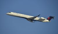 N692CA @ KLAX - Departing LAX on 25R - by Todd Royer