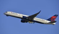 N547US @ KLAX - Departing LAX on 25R - by Todd Royer