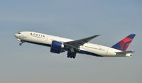 N702DN @ KLAX - Departing LAX on 25R - by Todd Royer