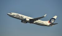 N594AS @ KLAX - Departing LAX on 25R - by Todd Royer
