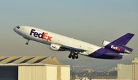 N366FE @ KLAX - Departing LAX on 25R - by Todd Royer
